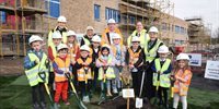 Provost and pupils plant tree as new school nears completion