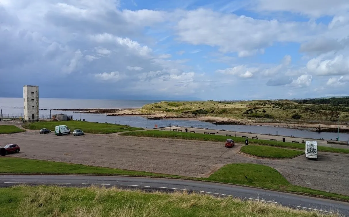 The Pilot House and car part at Irvine beach