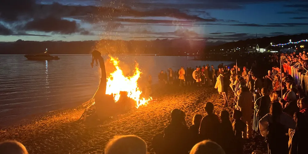 Traditional longboat burning at Largs seafront