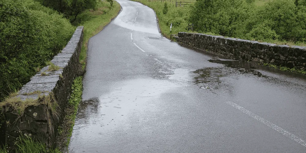 A countryside bridge on a rainy day