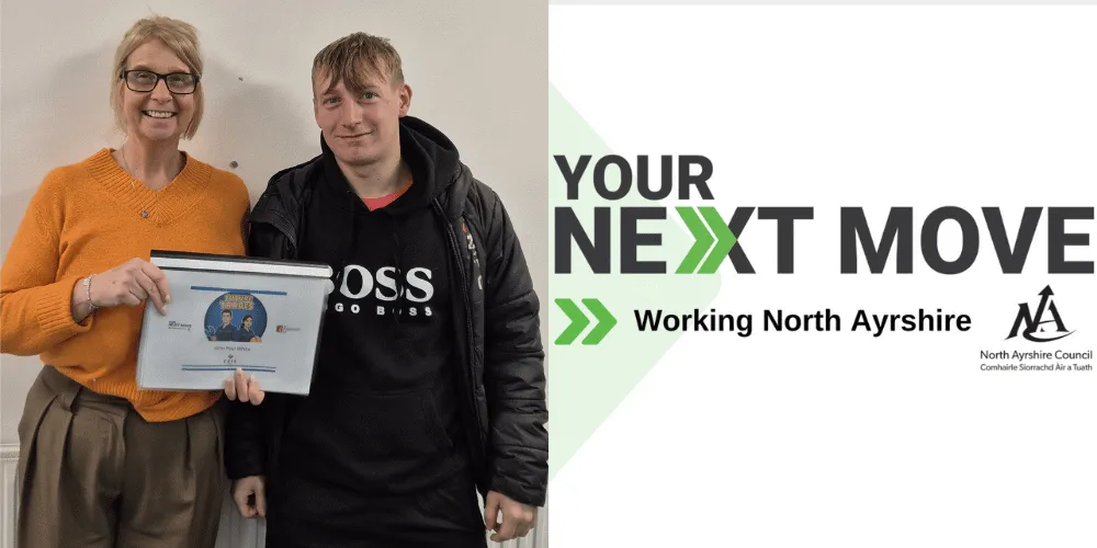 A woman, wearing an orange jumper, and a young man facing the camera holding a folder