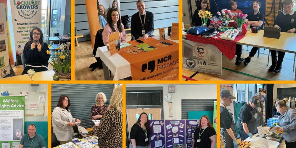 Adults and young people at tables discussing education opportunities