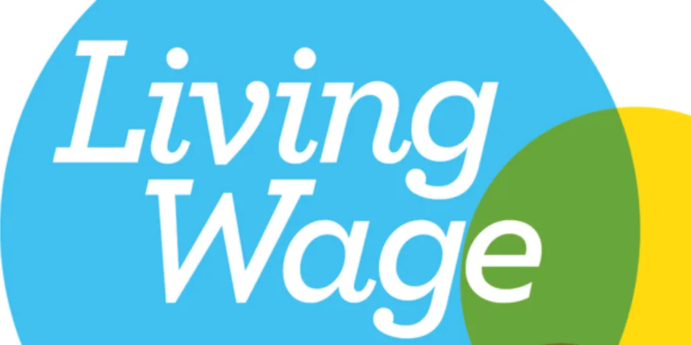 a graphic with the words living wage