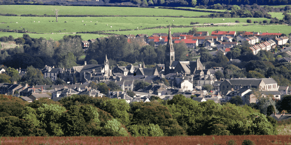An aerial shot showing a village in the countryside