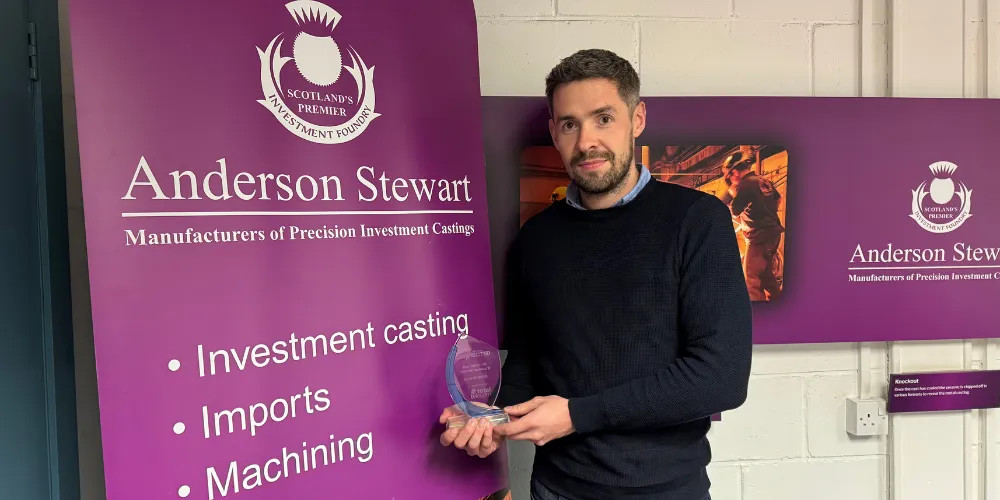 Scott Sneddon with award