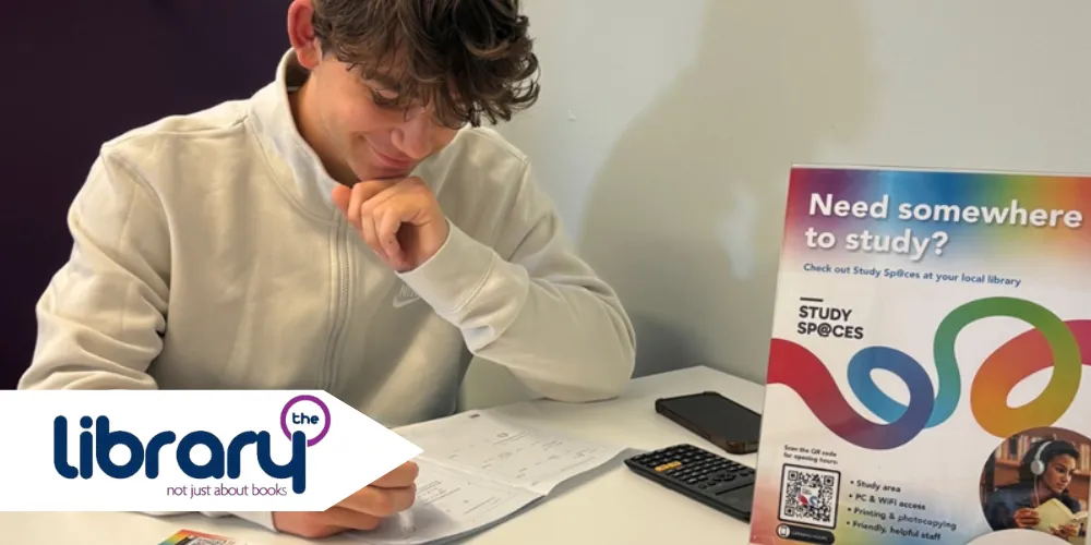 Young person studying at North Ayrshire Library study area