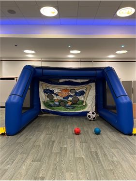 large inflatable goal post with footballs in Volunteer Rooms Irvine